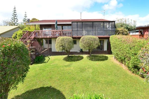 The Whangaparaoa home (backyard view) which hosted numerous All Black greats over the decades.